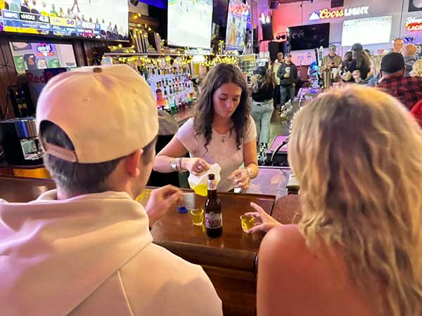 bartender serving shots